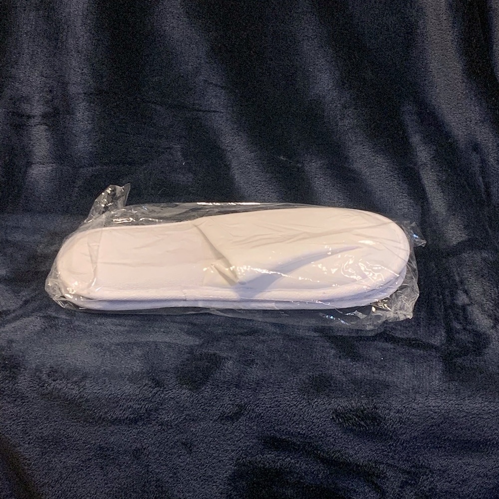 Brand new white spa slippers